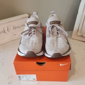 Nike Light Pink And White Athletic Shoes